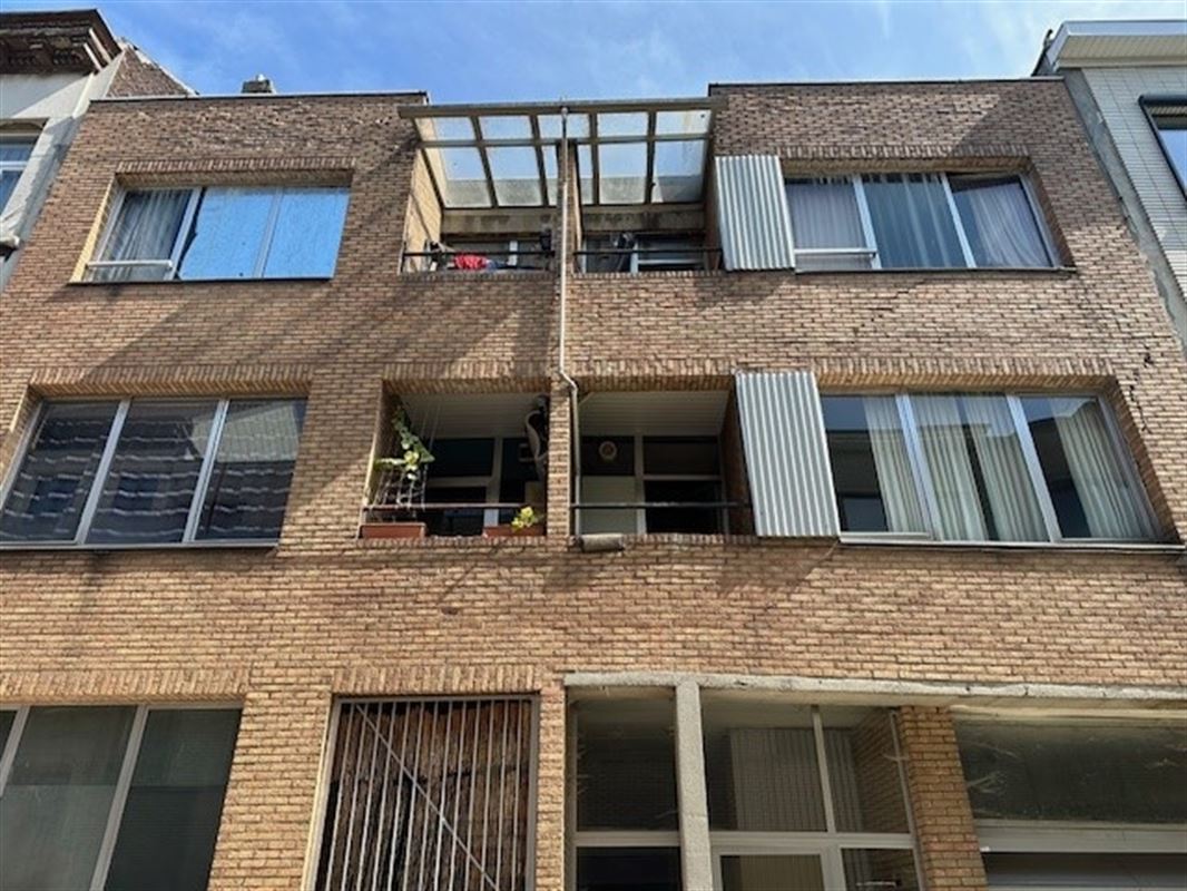 Te renoveren vergund appartementsgebouw