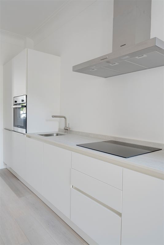 Prachtig gerenoveerd appartement met zuidgerichte tuin