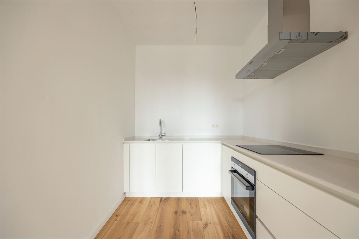 Gerenoveerd appartement met zonovergoten dakterras op toplocatie in Lier