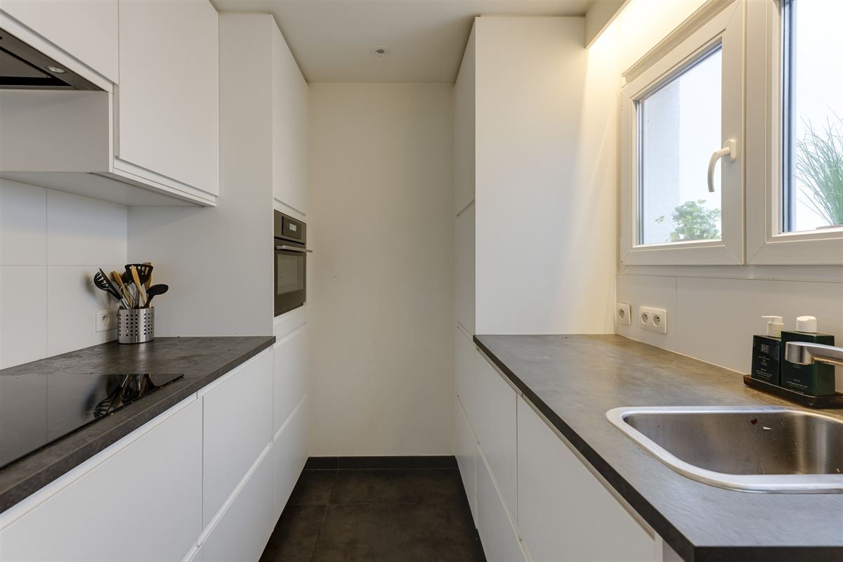 Cozy gelijkvloers appartement met stadskoer