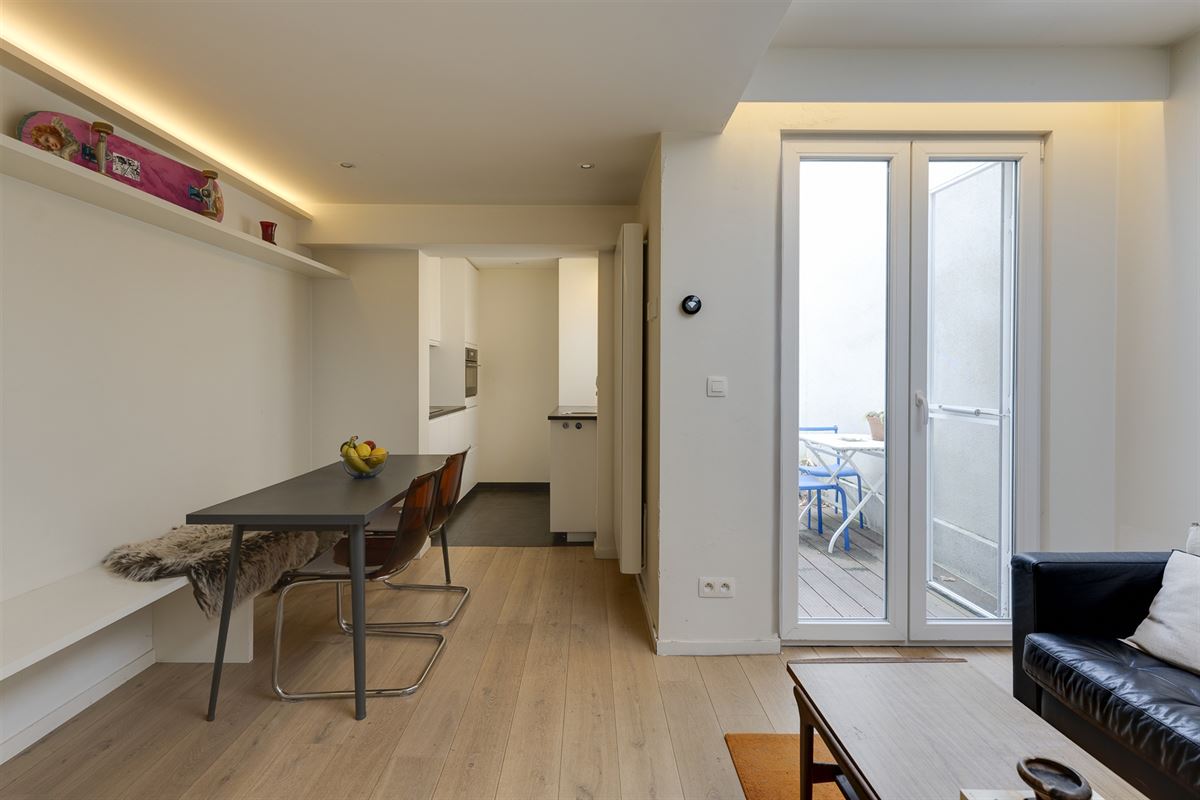 Cozy gelijkvloers appartement met stadskoer