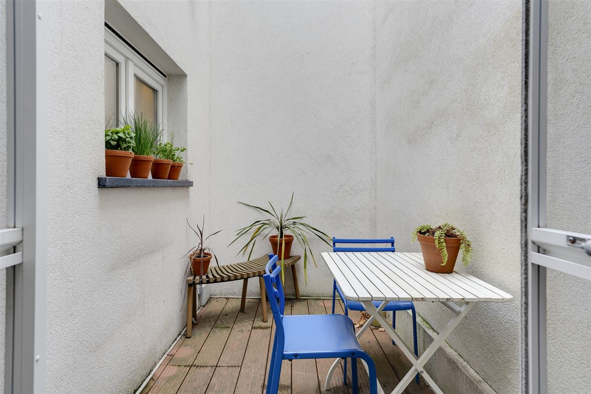 Cozy gelijkvloers appartement met stadskoer