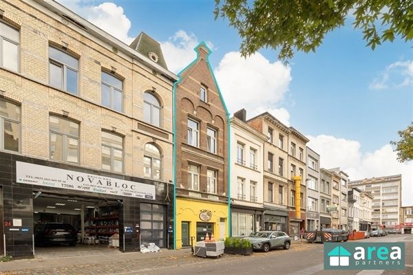 Handelswoning gelegen op centrale & commerciële locatie!