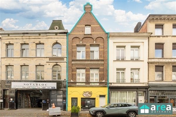 Handelswoning gelegen op centrale & commerciële locatie!