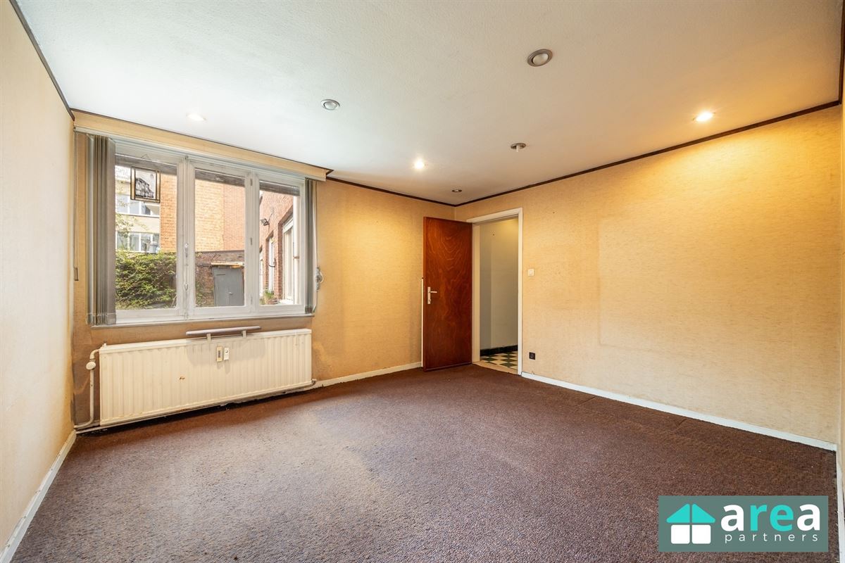 Gelijkvloersappartement van 224,58m² met garage en tuin!