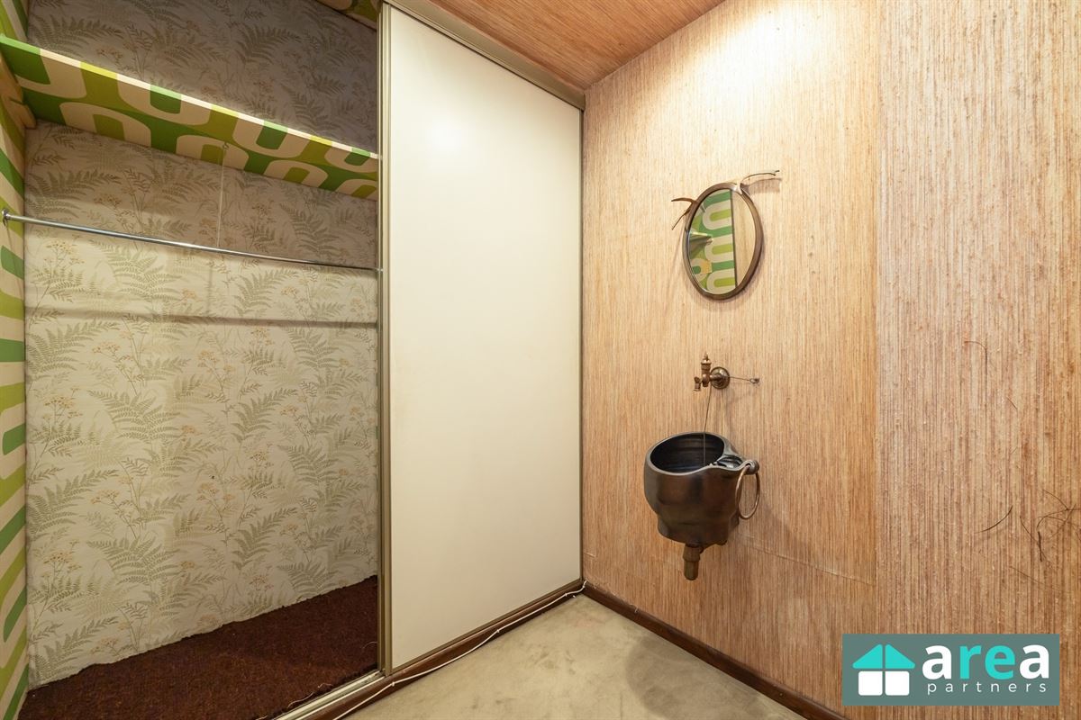 Gelijkvloersappartement van 224,58m² met garage en tuin!