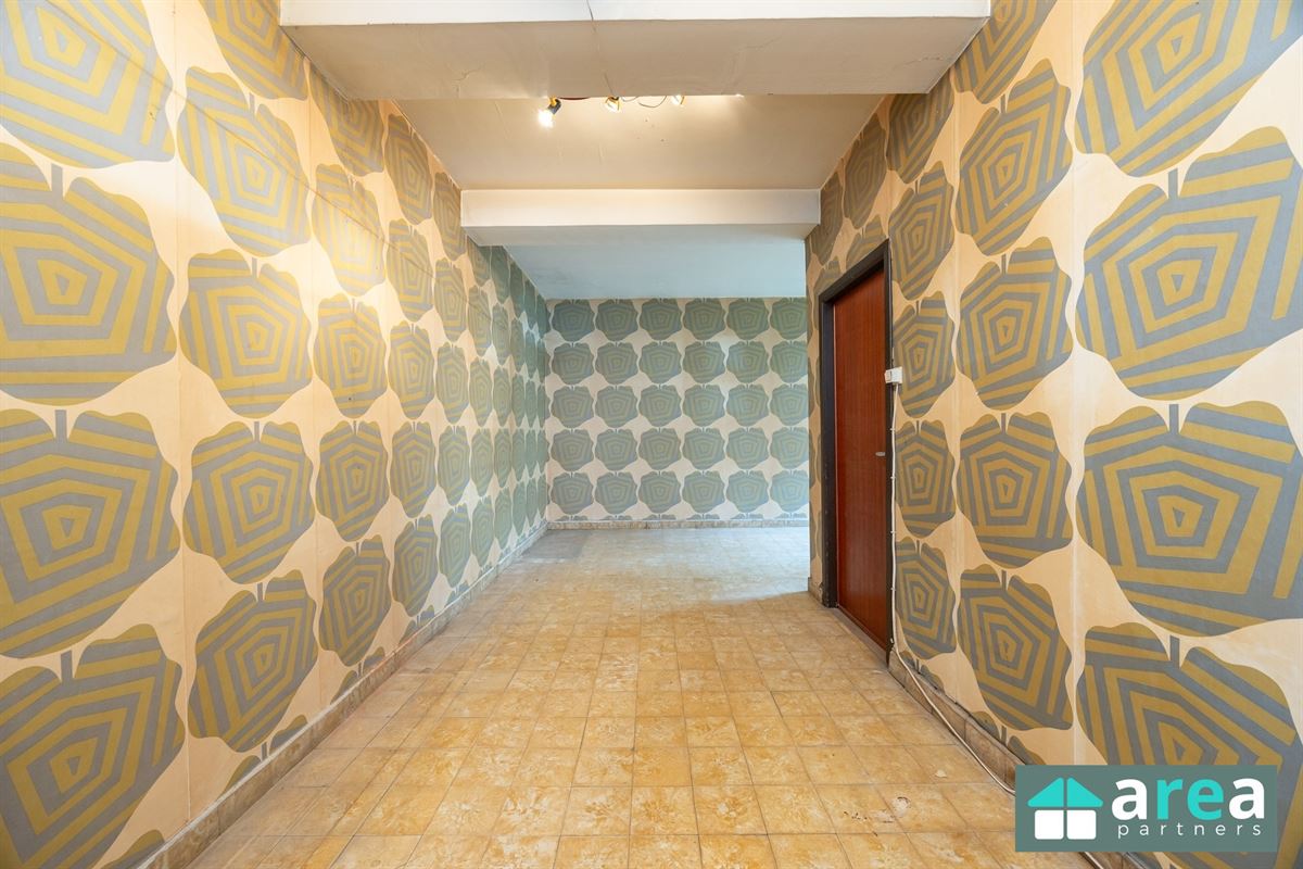 Gelijkvloersappartement van 224,58m² met garage en tuin!