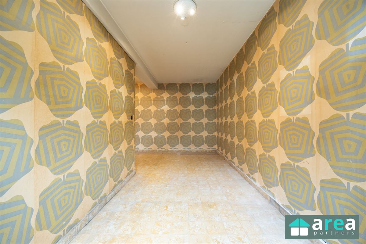 Gelijkvloersappartement van 224,58m² met garage en tuin!