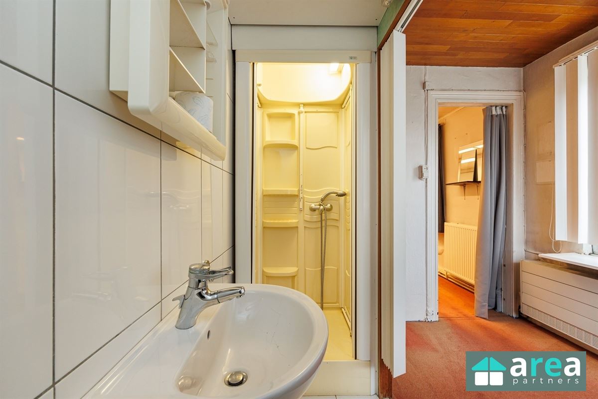 IN OPTIE! - Woning met handelsgelijkvloers op gunstige locatie!