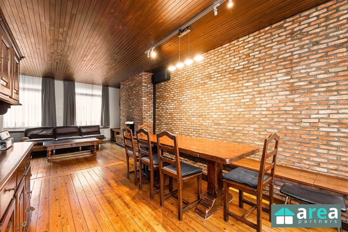 IN OPTIE! - Woning met handelsgelijkvloers op gunstige locatie!