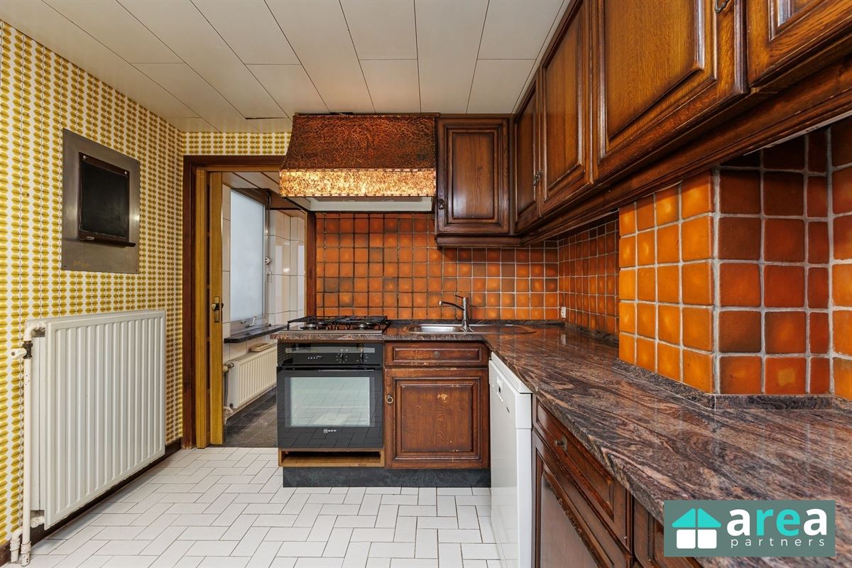 IN OPTIE! - Woning met handelsgelijkvloers op gunstige locatie!