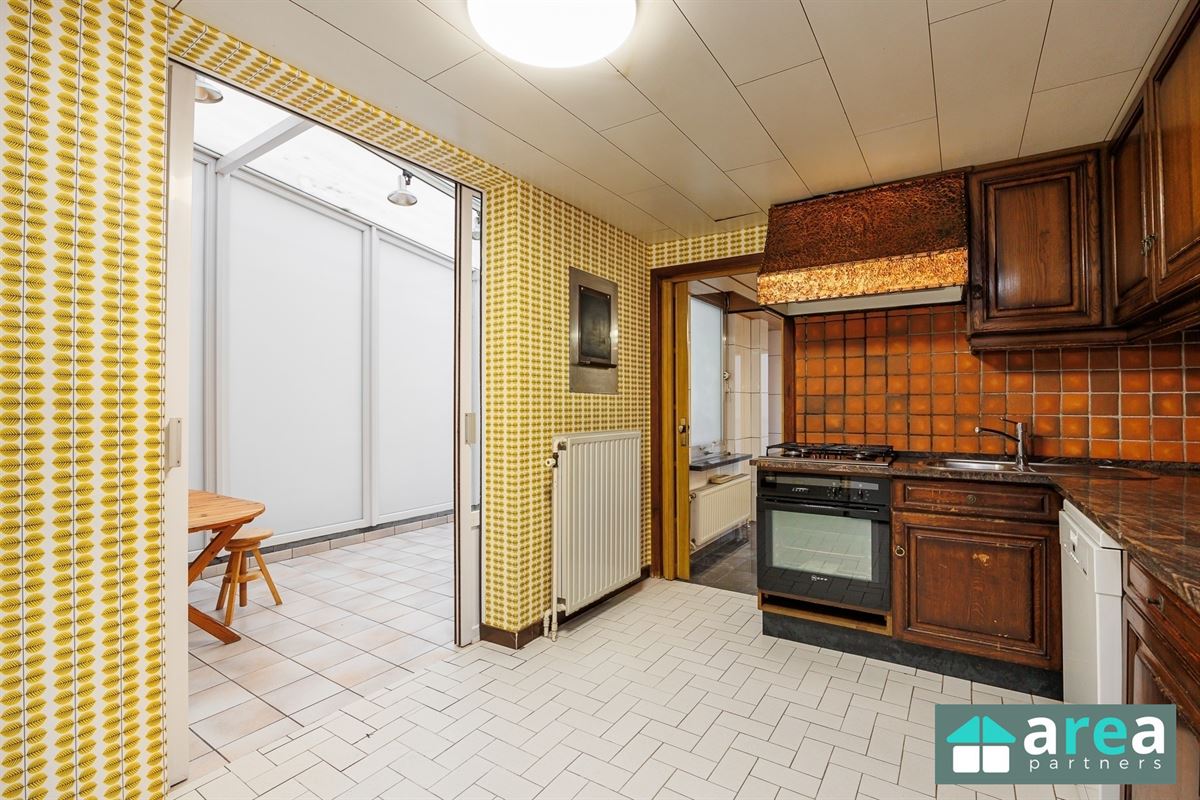 IN OPTIE! - Woning met handelsgelijkvloers op gunstige locatie!