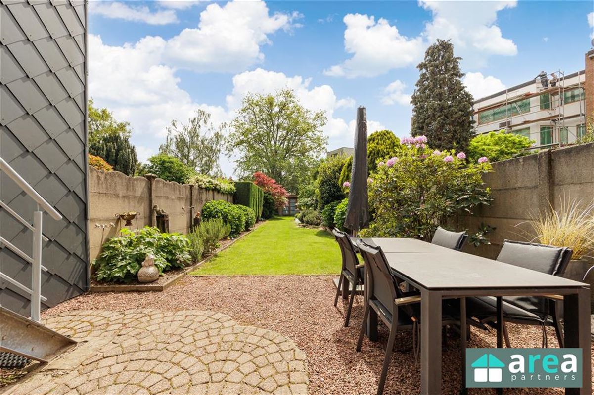 Instapklare gezinswoning met grote tuin en garage!