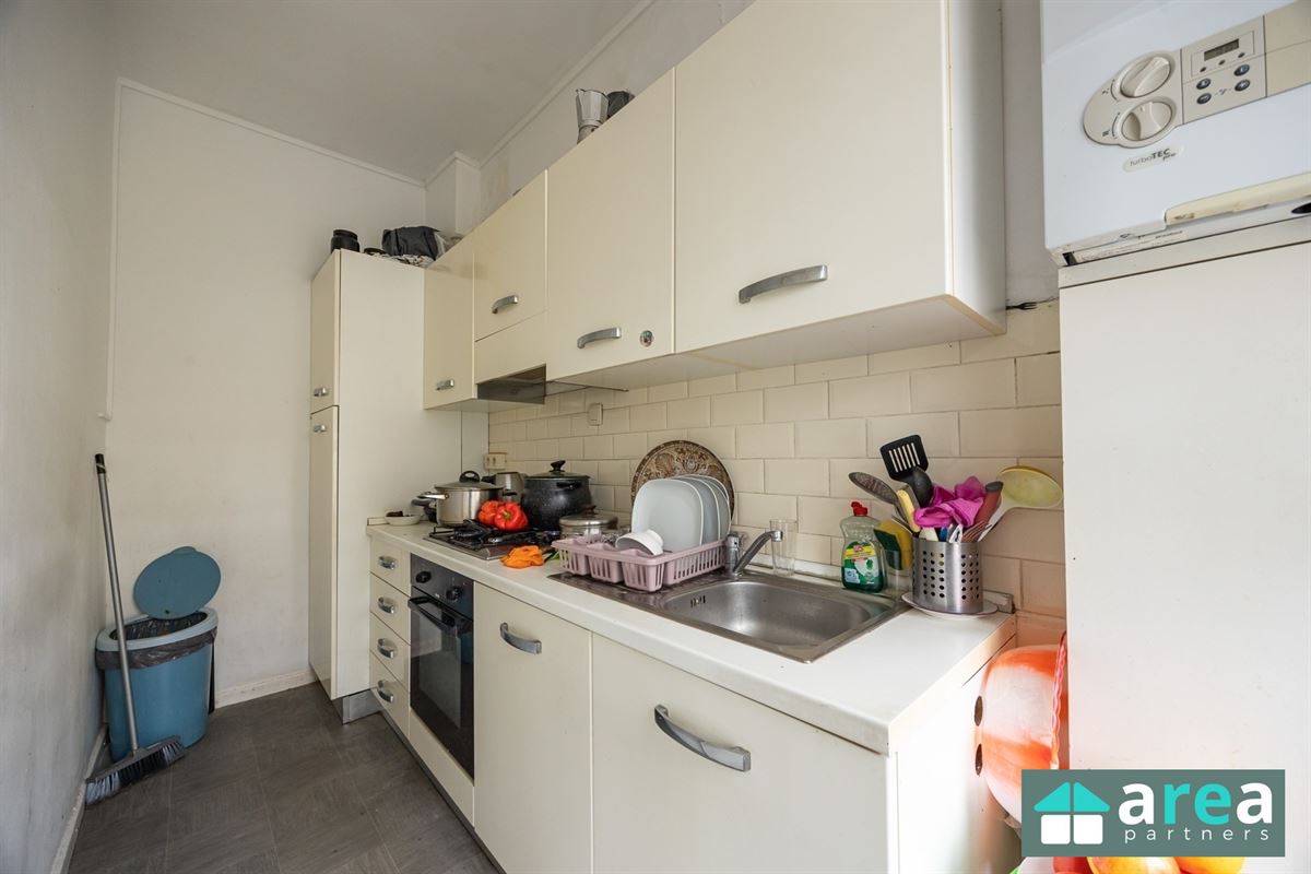 Opbrengsteigendom bestaande uit handelszaak + 3 appartementen