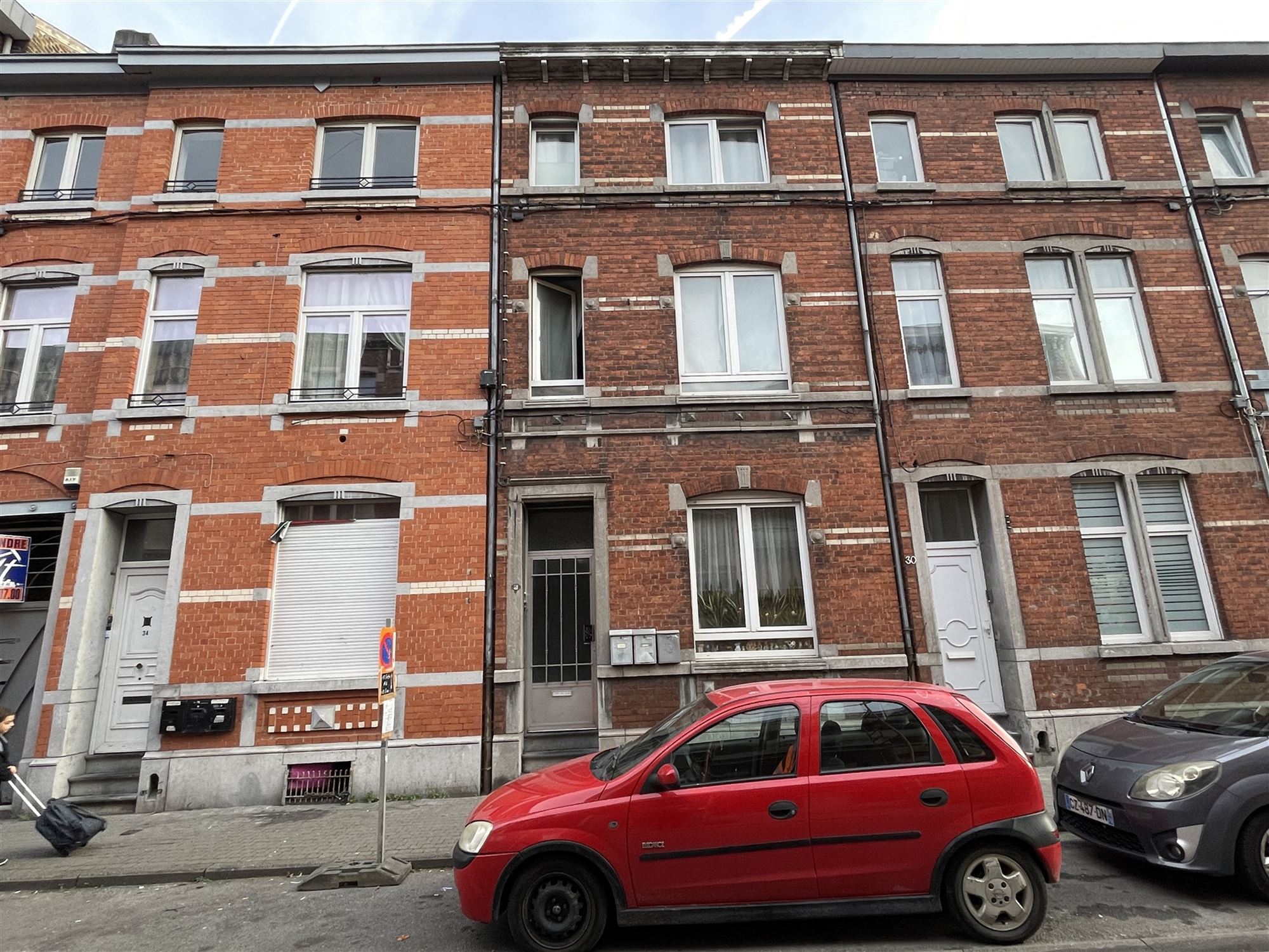 Immeuble composé de trois appartements.