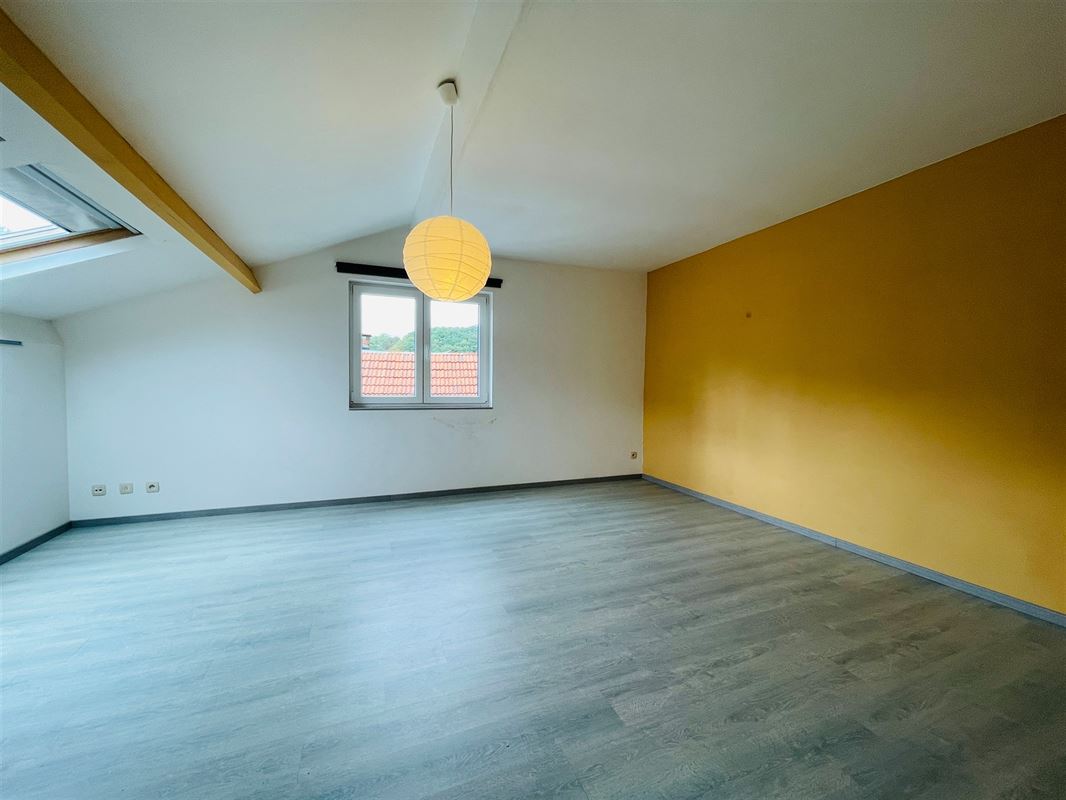 en retrait aux abords espaces verts maison 2 ch récente