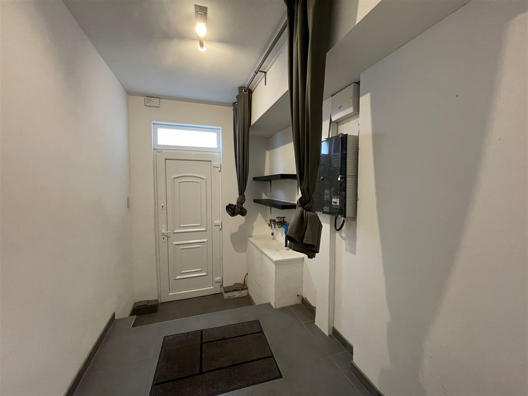 en retrait aux abords espaces verts maison 2 ch récente