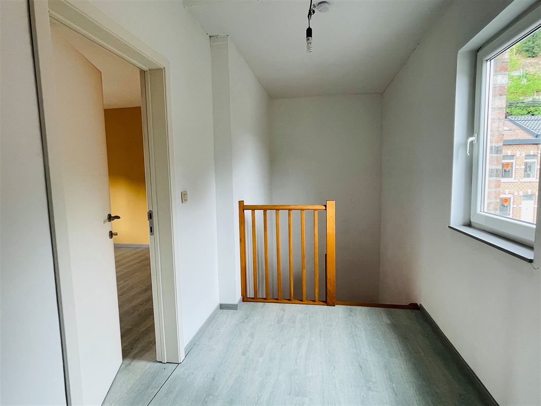 en retrait aux abords espaces verts maison 2 ch récente