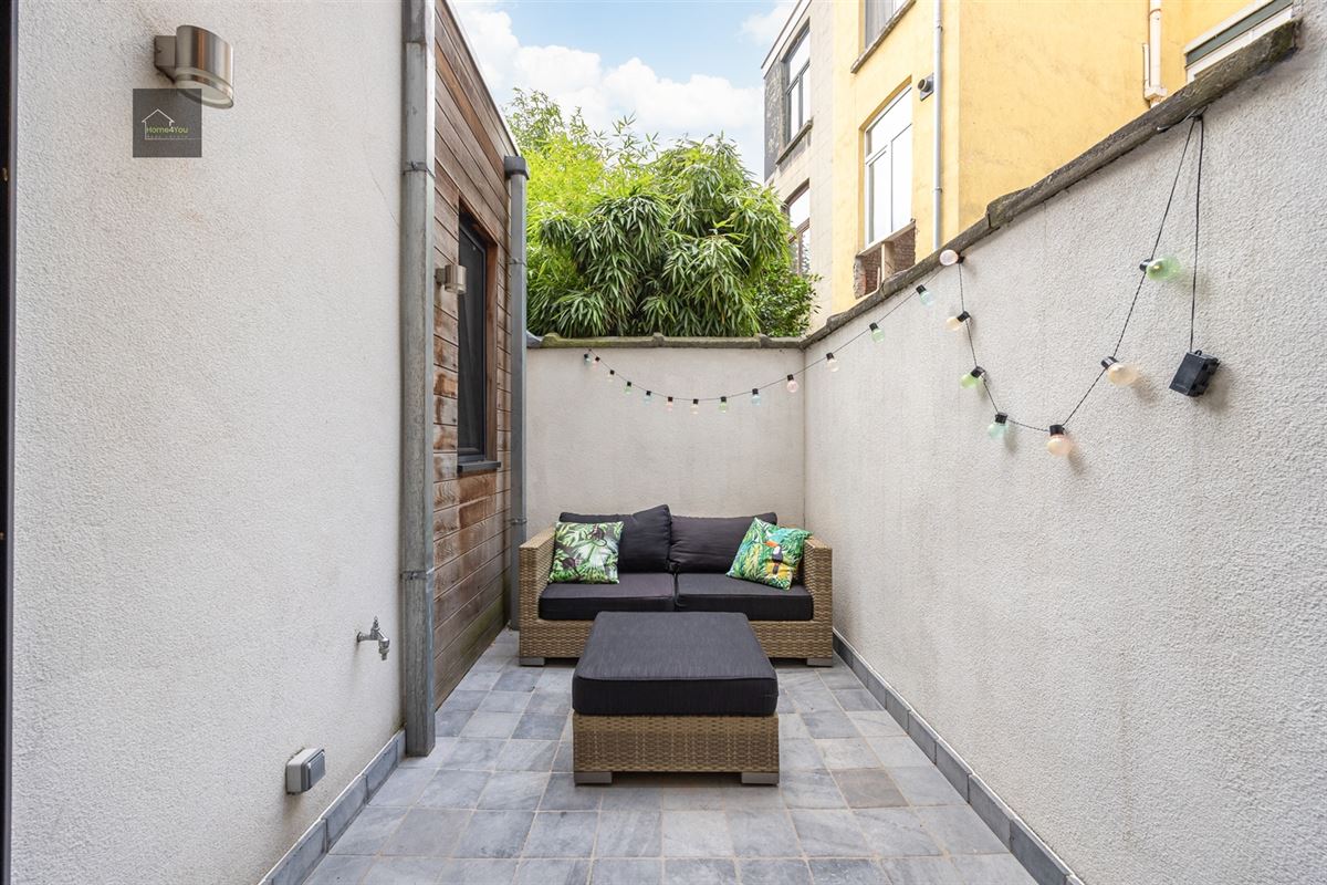 Gerenoveerd appartement met buitenruimte 
