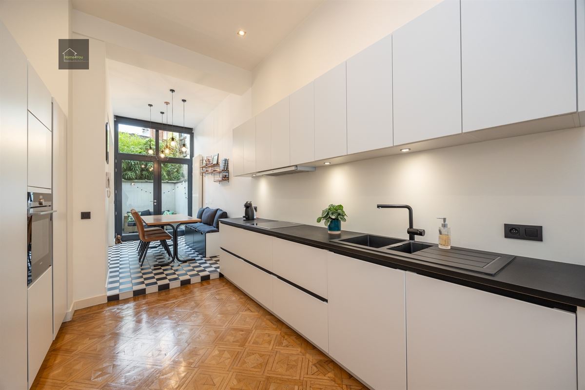 Gerenoveerd appartement met buitenruimte 