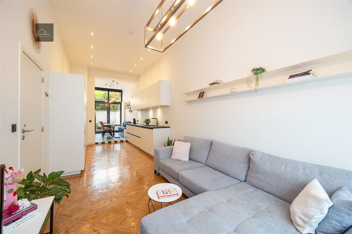 Gerenoveerd appartement met buitenruimte 