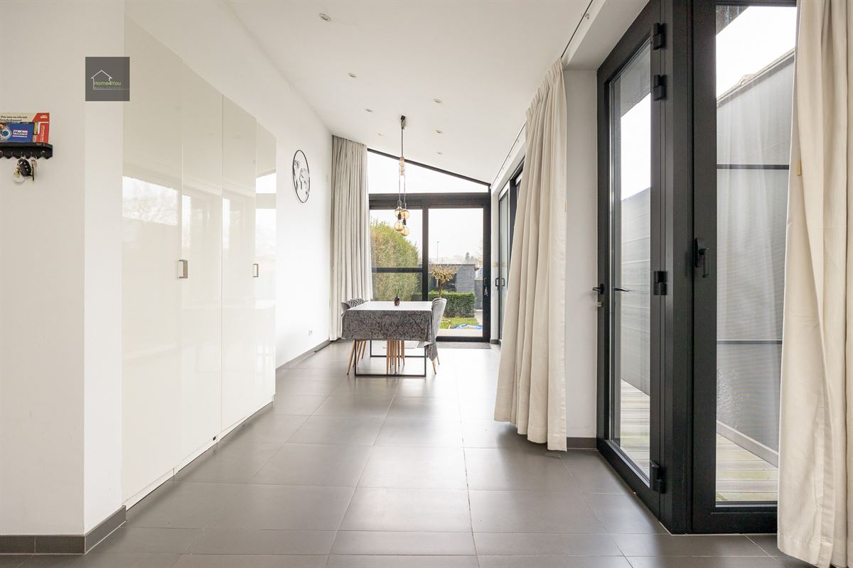 Gerenoveerde en instapklare woning met garage en zonnige tuin
