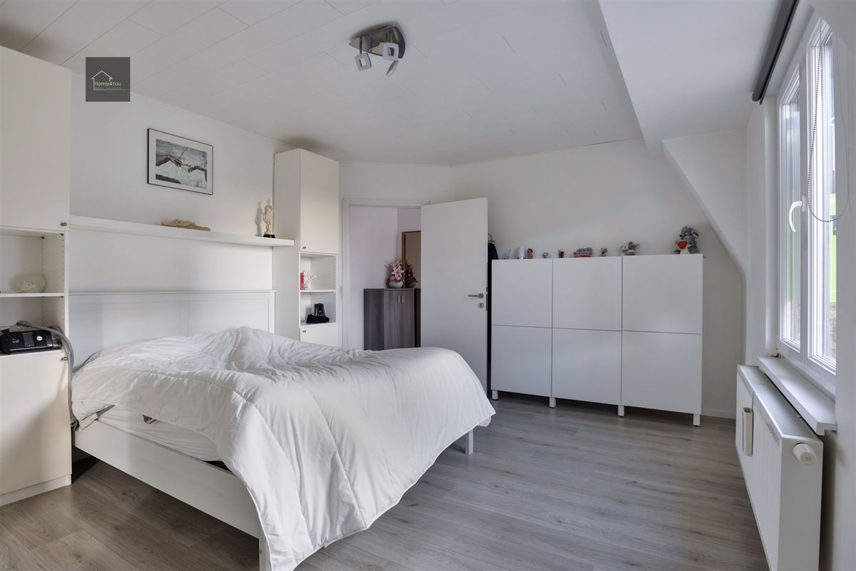 Gerenoveerde rijwoning met 2 slaapkamers, mooie tuin/terras.