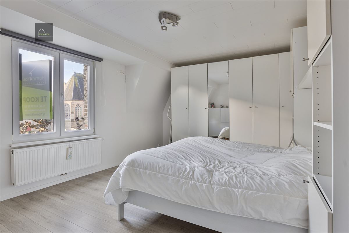 Gerenoveerde rijwoning met 2 slaapkamers, mooie tuin/terras.