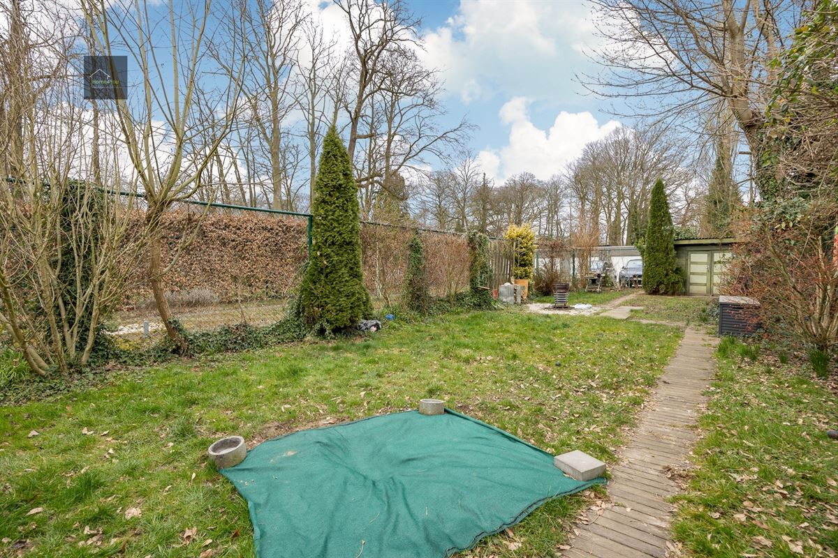 Ruim gelijkvloers appartement met tuin, parking en garagebox