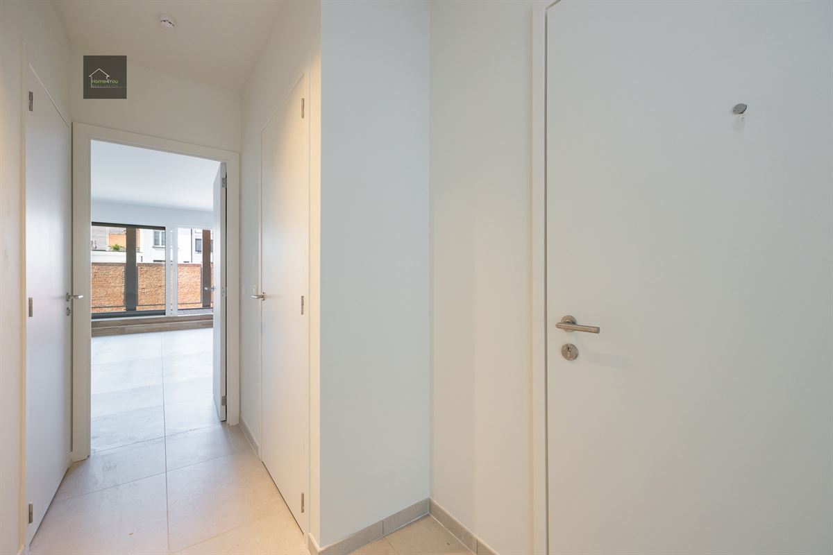 Appartement met terras en autostaanplaats