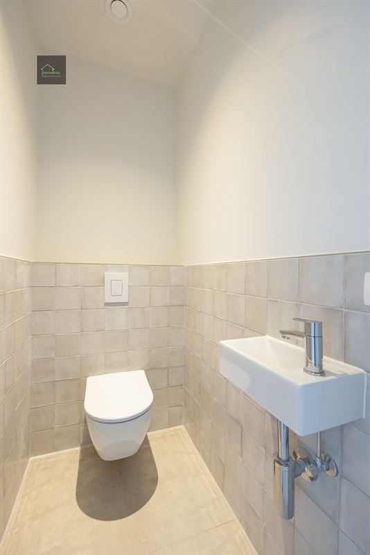 Appartement met terras en autostaanplaats