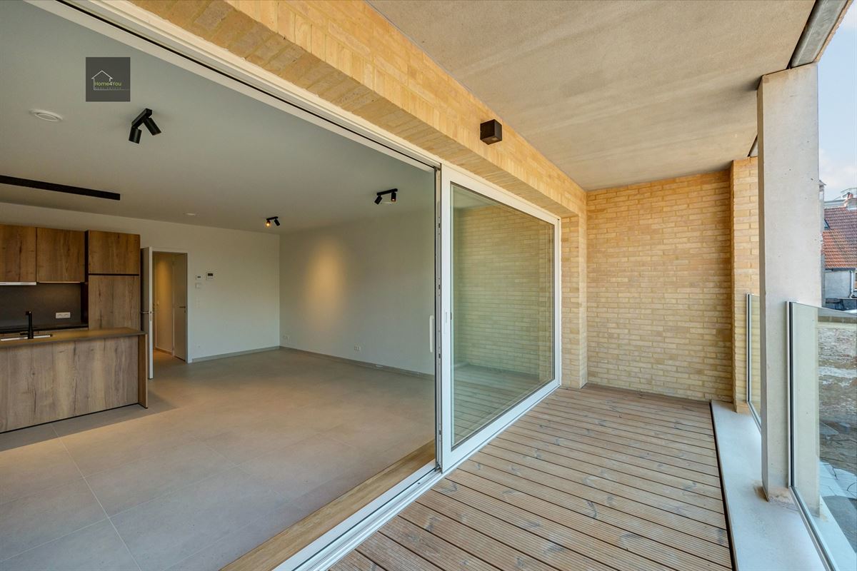 Appartement met terras en autostaanplaats