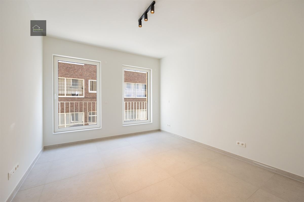 Appartement met terras en autostaanplaats