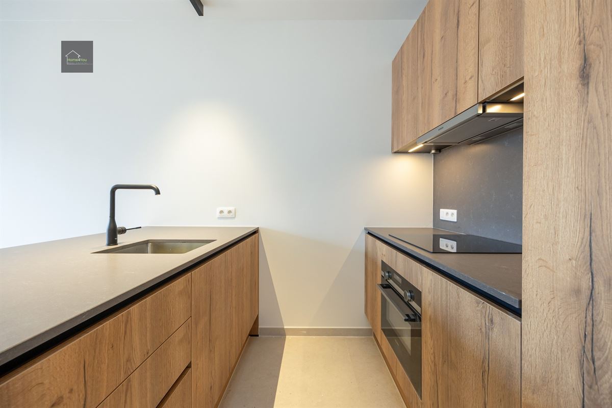 Appartement met terras en autostaanplaats
