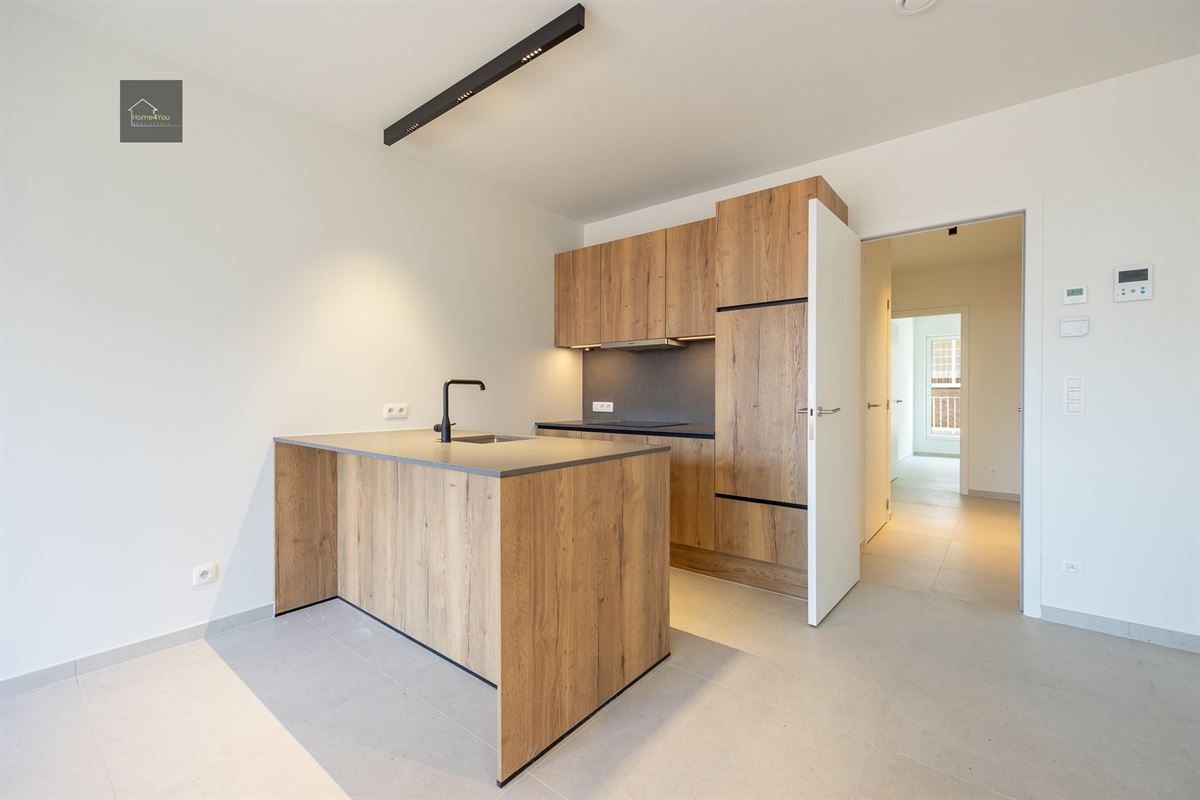 Appartement met terras en autostaanplaats