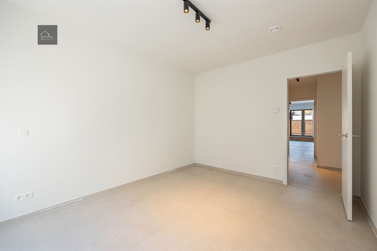 Appartement met terras en autostaanplaats