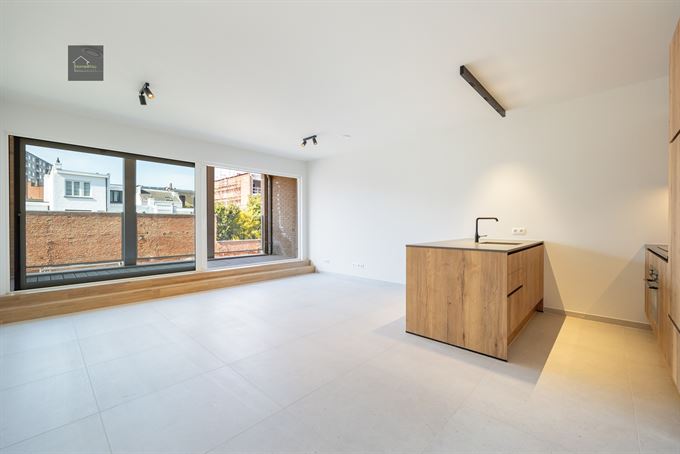 Appartement met terras en autostaanplaats