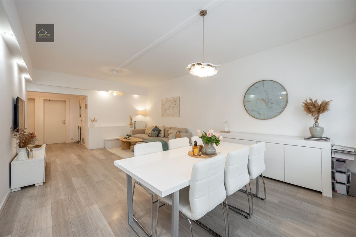 Gelijkvloers appartement met grote tuin en garage