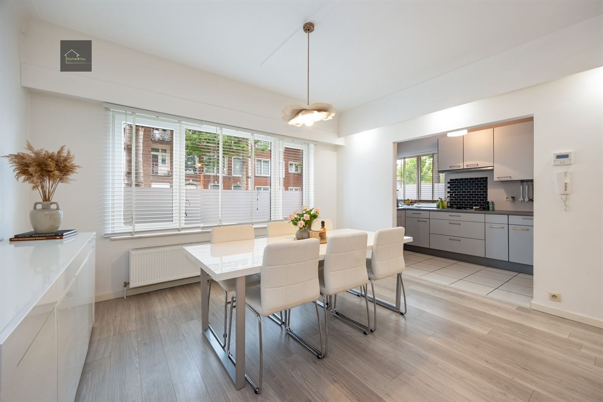 Gelijkvloers appartement met grote tuin en garage