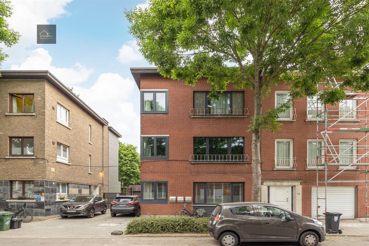 Gelijkvloers appartement met grote tuin en garage