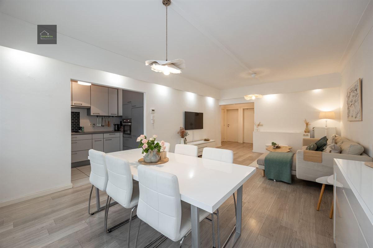Gelijkvloers appartement met grote tuin en garage