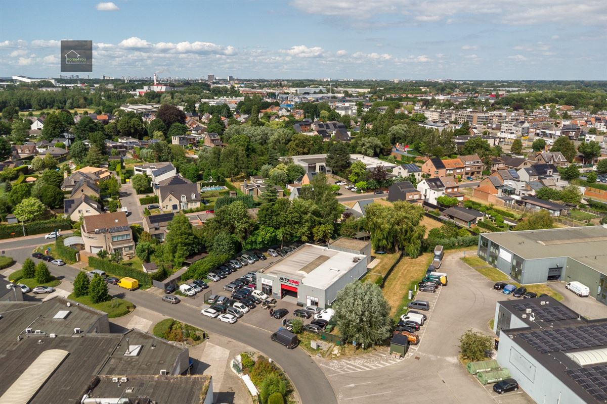 Nijverheidsgebouw + woning 
