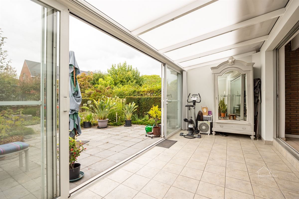 Halfopen bebouwing met tuin en atelier