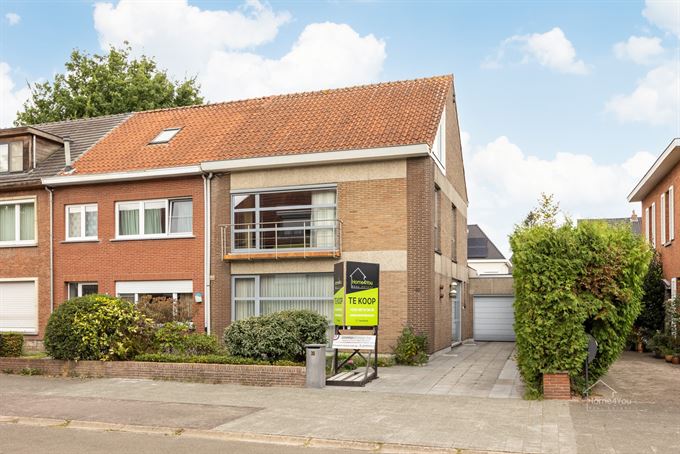 Halfopen bebouwing met tuin en atelier