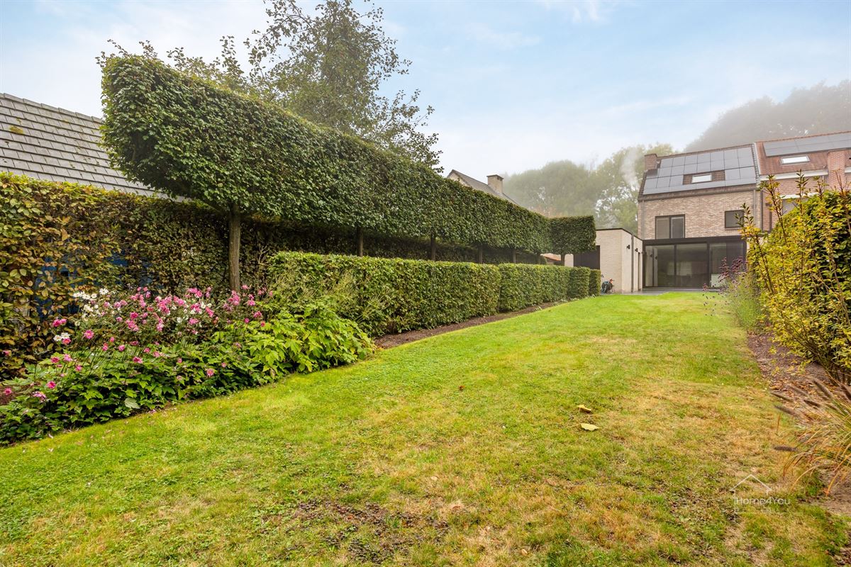 Instapklare gezinswoning met 4 slaapkamers en tuin