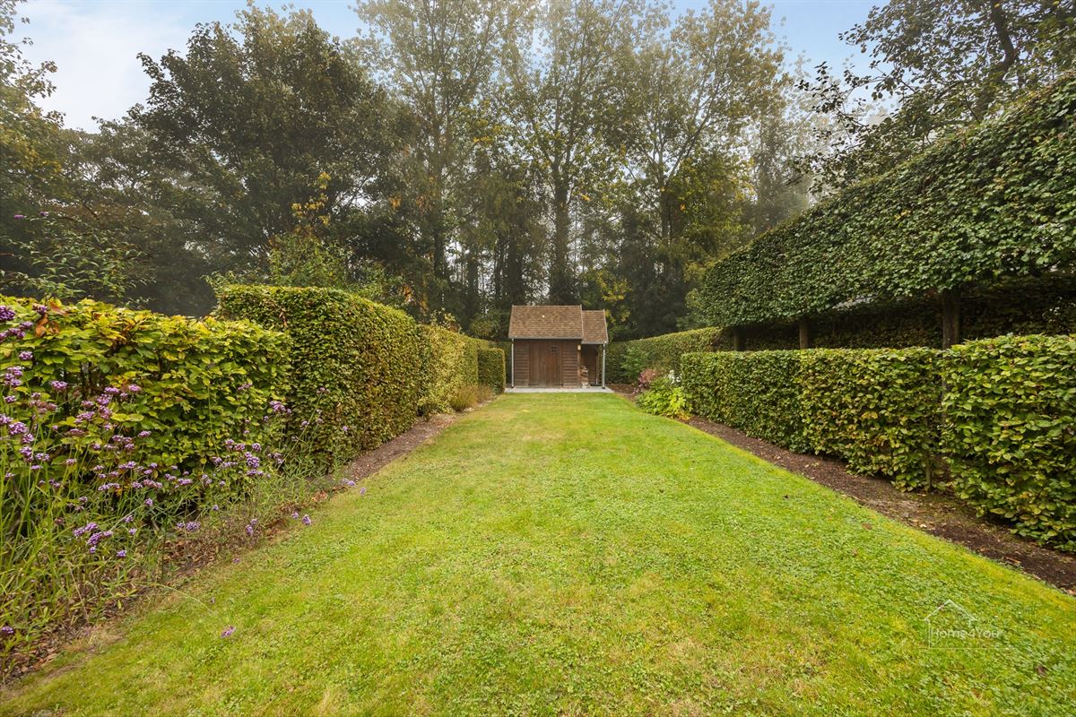 Instapklare gezinswoning met 4 slaapkamers en tuin
