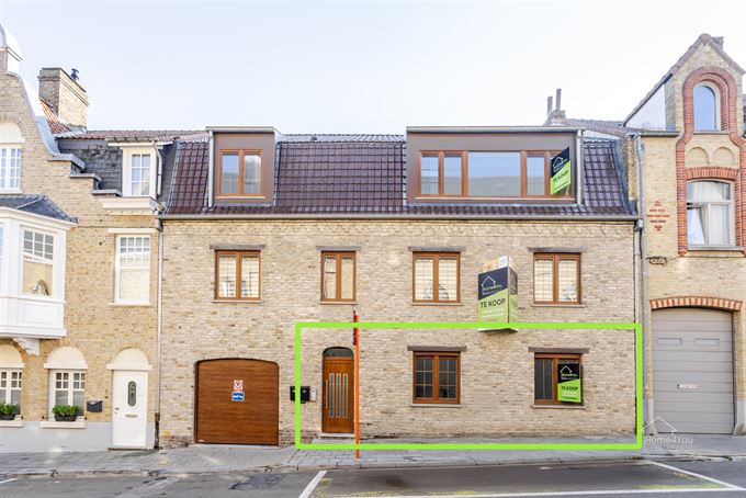 Volledig vernieuwd GLV appartement, terras en 2 slaapkamers 