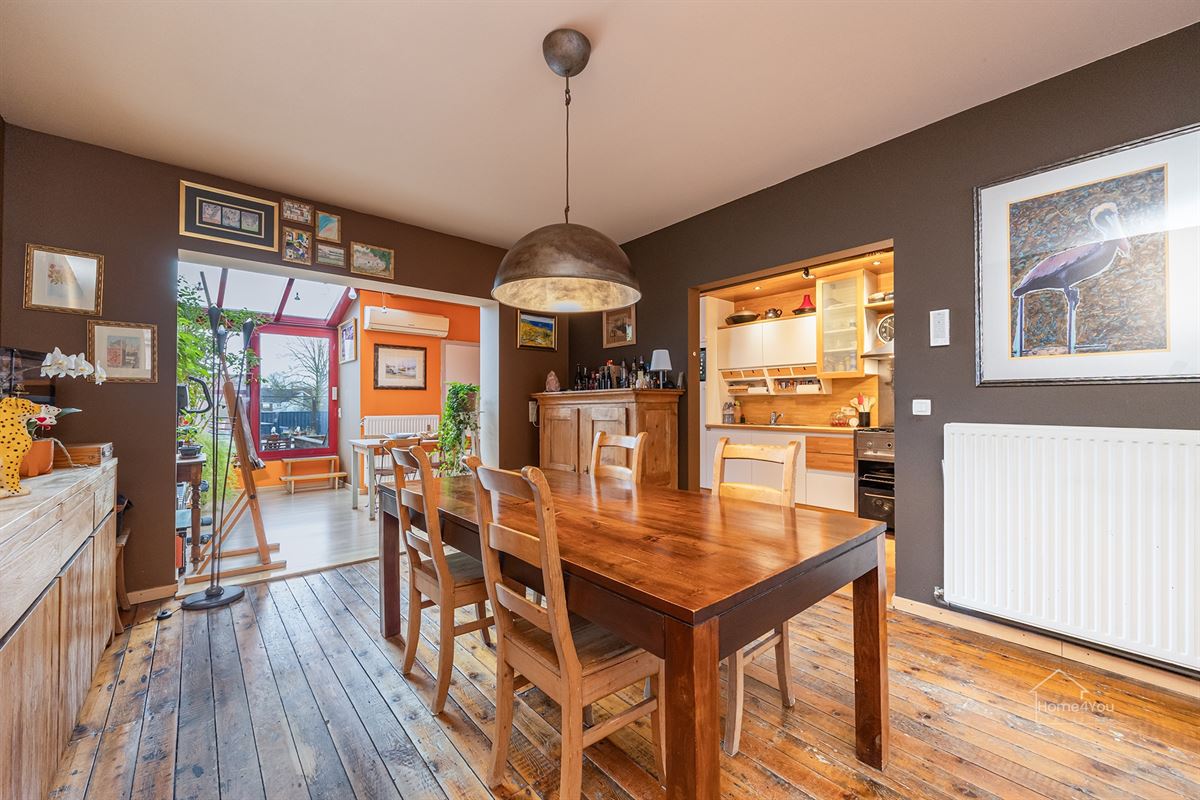 Veelzijdig handelshuis met ruim duplex appartement