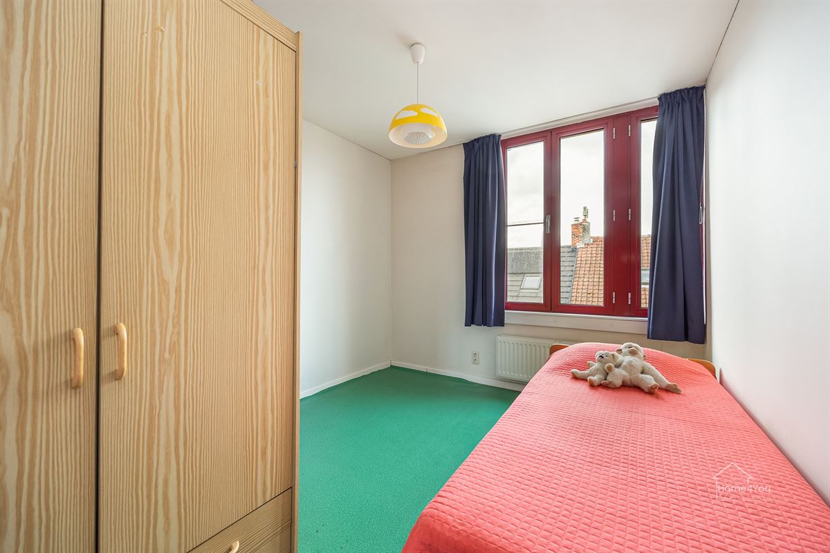 Veelzijdig handelshuis met ruim duplex appartement