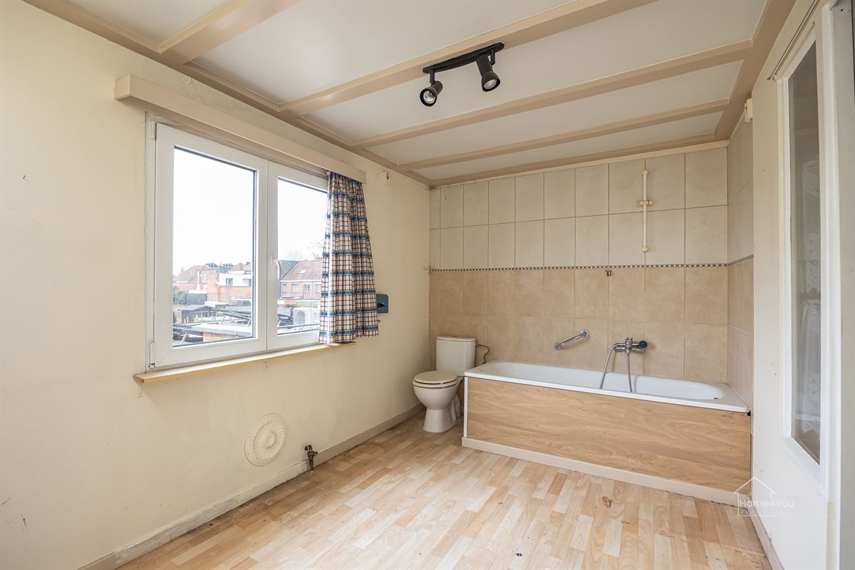 Te renoveren woning met groot potentieel en tuin te Bornem
